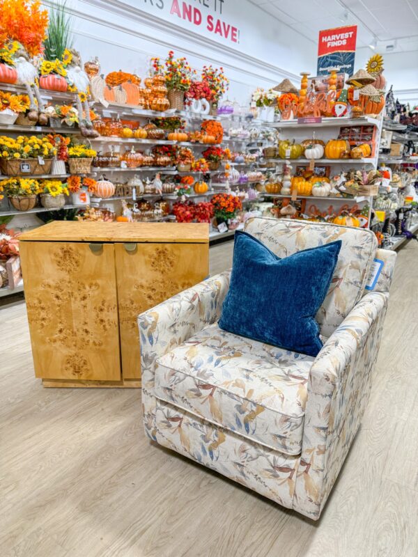 Fall flowers, pumpkins, chair and chest