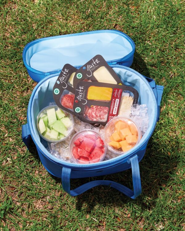 Cooler with fruit, cheese, and meat